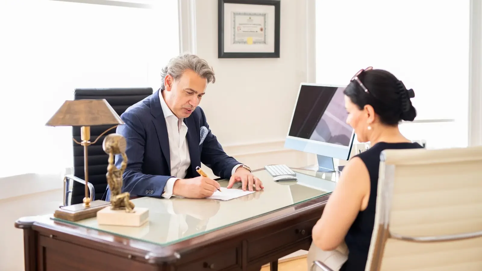Cardiologist Dr Francesco Lo Monaco in a face-to-face consultation with a patient during a private heart assessment